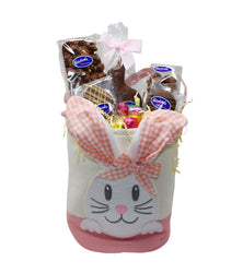Pink Easter Bunny Bucket Basket filled with Easter themed chocolate treats