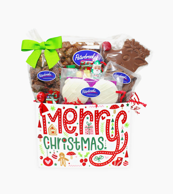 Christmas-themed gift basket with Peterbrooke products on a white background