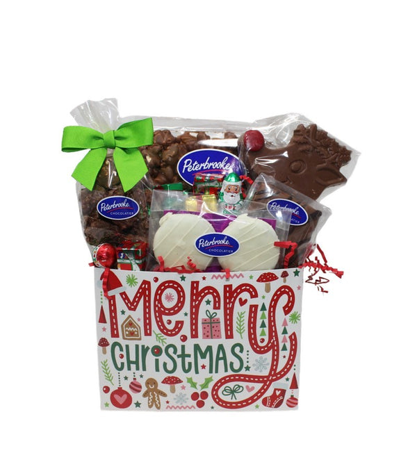 A festive Christmas-themed gift box containing an assortment of Peterbrooke chocolates including milk chocolate covered popcorn, pretzel nuggets, hand-dipped milk chocolate Oreos, hand-dipped milk chocolate graham crackers, a solid chocolate Rudolph pop, and holiday chocolate foils.