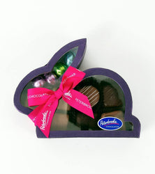 Bunny shaped box filled with assorted Peterbrooke chocolates.